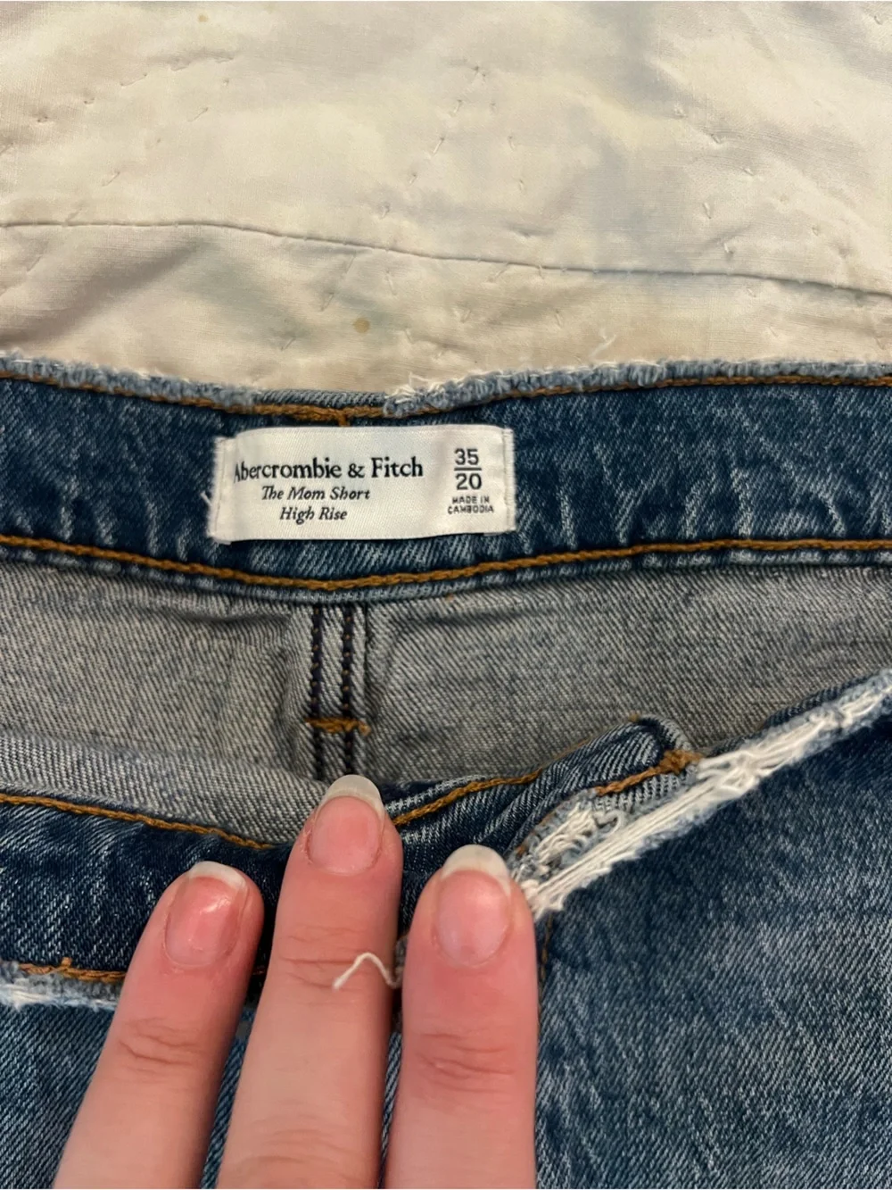 Abercrombie & Fitch Distressed Dark Blue Jean “The Mom Short” High-Rise